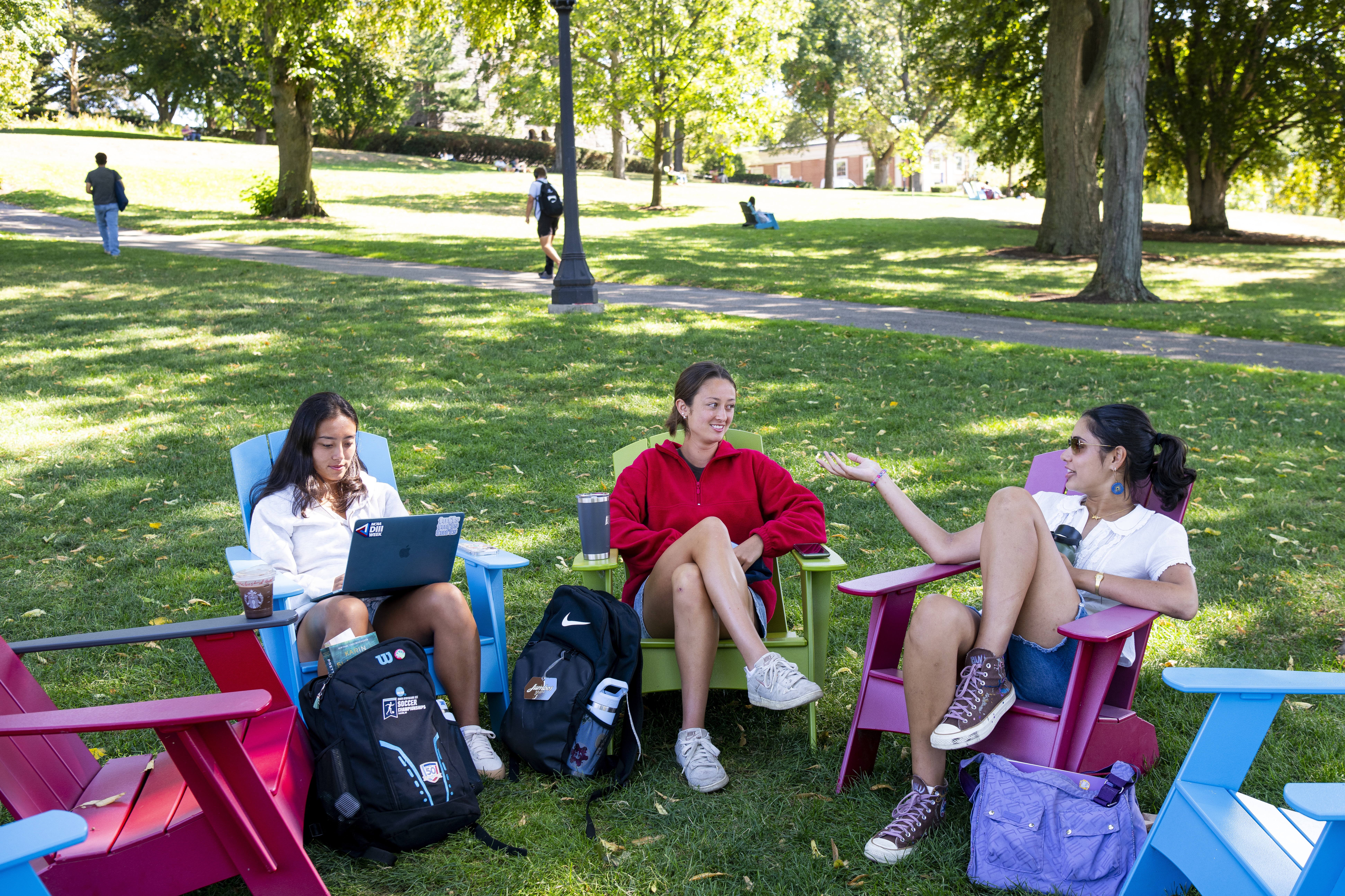 Students chat on Academic Quad.